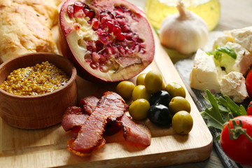 Ingredients of Mediterranean cuisine, on wooden board background