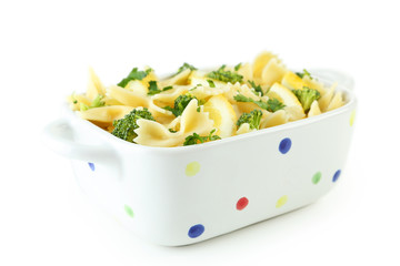 Delicious pasta with with broccoli in bowl isolated on white