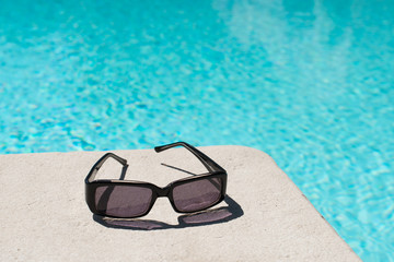 Swimming pool and sunglasses