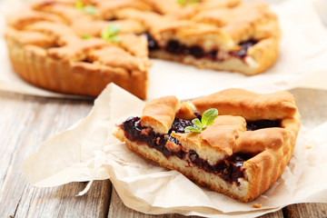 Homemade pie on grey wooden background