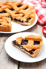 Homemade pie on grey wooden background