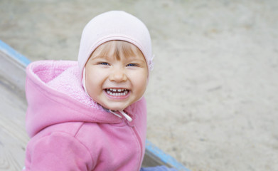 Portrait of a smiling baby on a walk