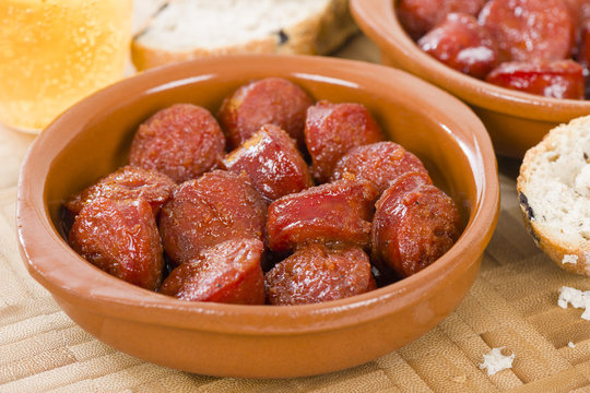 Chorizo a la Sidra - Spanish spicy chorizo sausages cooked in cider.
