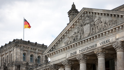 Obraz premium Reichstag, Berlin, Germany. The dedication on the face of the German parliament building, Dem Deutschen Volke, translates as 