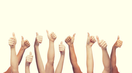 human hands showing thumbs up