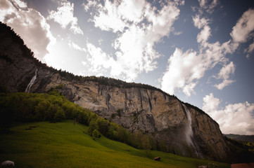 Beautiful waterfall in Lauterbrunnen swiss village.