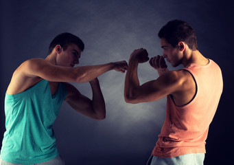 young men wrestling