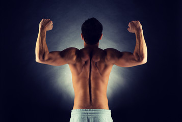 Fototapeta premium young male bodybuilder from back