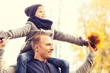 happy family having fun in autumn park