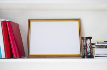 Wooden frame for certificate on the shelf