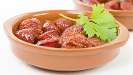 Chorizo a la Sidra - Spanish spicy chorizo sausages cooked in cider.
