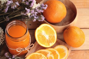 Orange juice with fresh orange fruits sliced.