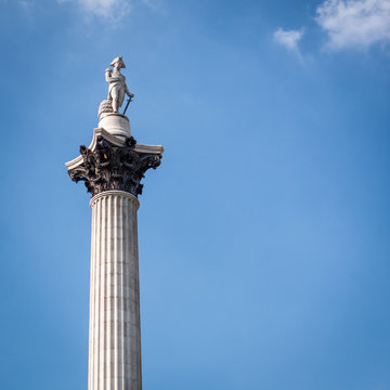 Nelson's Column, London. Low angle view of the London landmark Nelson's Column set against blue sky copy space.