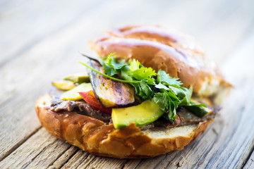 sandwich on wooden table