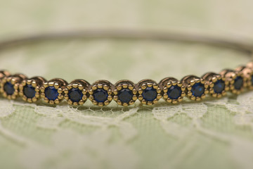 Bracelet against green background