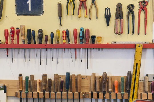 Carpenters tools organised on a wall