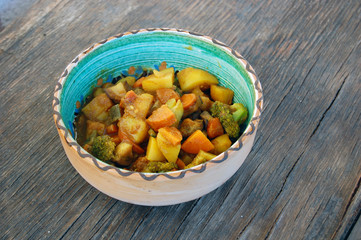 closeup of Indian meal. fresh seasonal vegetables with curry sauce