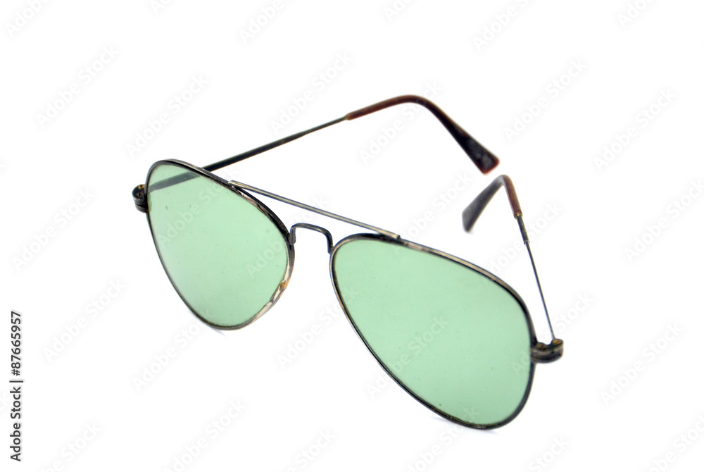 Wall mural Green sunglasses isolated on white