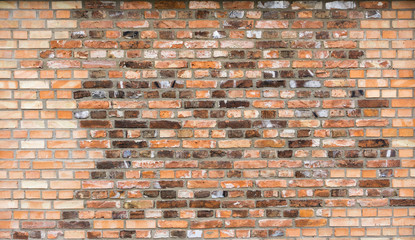 Wall from the combined old and new bricks