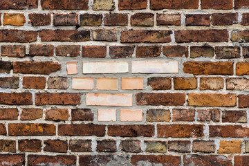 Wall from the combined old and new bricks