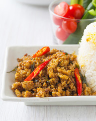 Traditonal food of Southern Thailand Spicy fried pork with chili paste and herb vegetable