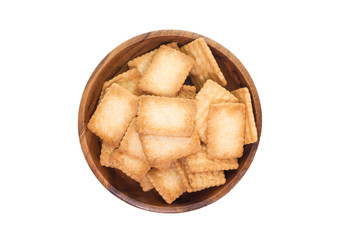Mini coconut biscuit in wood plate isolated on white background