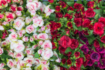 Obraz premium Colourful artificial flower made from plastic and fabric