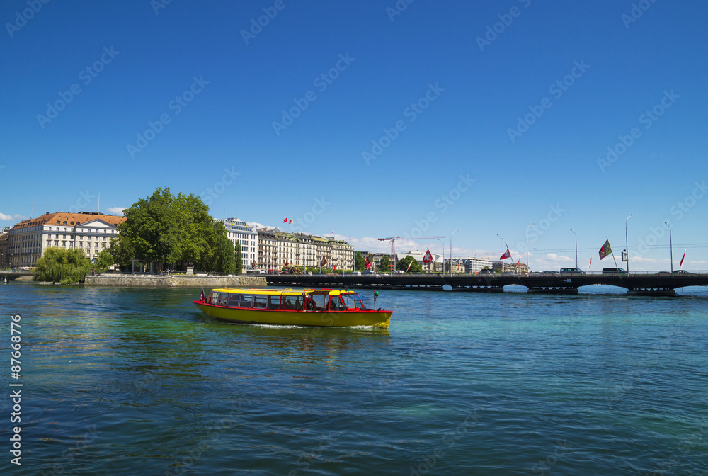 Wall mural View of Geneva Lake with boat transportation in Geneva Harbor,Switzerland