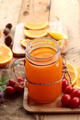 Orange juice with fresh orange fruits sliced.