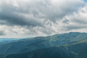 Fototapeta premium Landscape with clouds in the mountains 