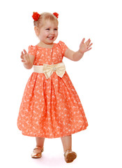 Little girl plays hide and seek