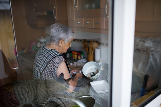 Elderly woman in the kitchen