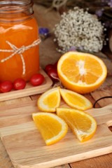 Orange juice with fresh orange fruits sliced.