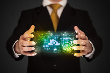 Businessman holding data cloud