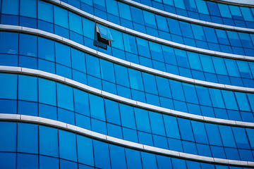 Office building in the rays of the rising sun