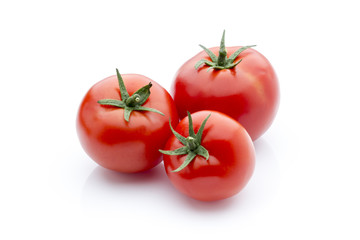 Tomato on the white isolatd background.