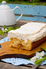 Delicious homemade cake with meringue and tea