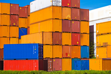 Fototapeta premium Orange containers stacked in Port of Rotterdam