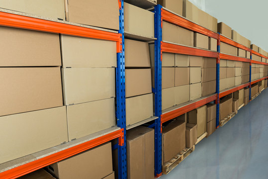 Warehouse Shelf With Cardboard Boxes