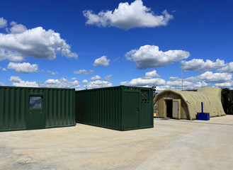 Containers and the tent
