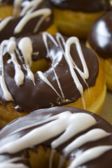This is a photograph of Vanilla and Chocolate marble donuts