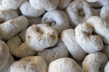 This is a photograph of Powdered sugar donuts