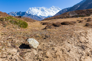 Stone and Kongde Ri mountain ridge snow peaks.