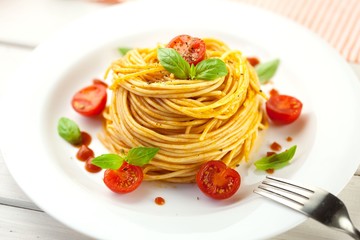 Italian pasta, tomato slice, italian cuisine.