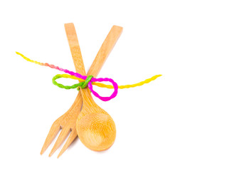 wooden spoon and fork isolated on white