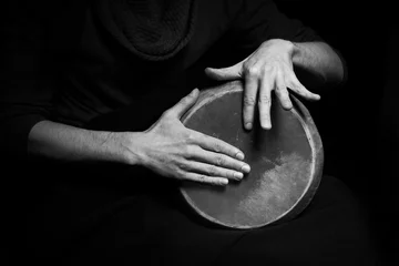 Fotobehang  black and white photo of hand drum © Glebstock