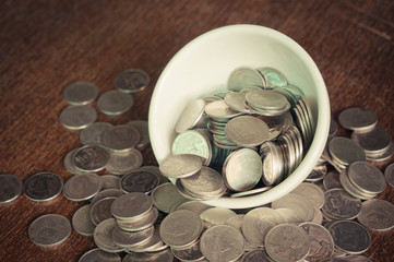 Coin in the cup with filter effect retro vintage style