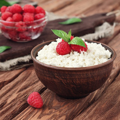 Dessert of cottage cheese and fresh raspberries