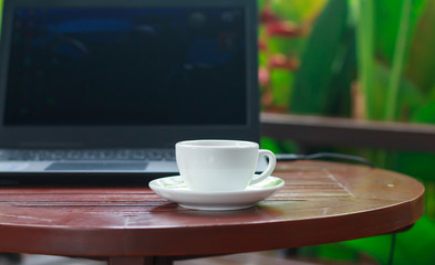 Coffee cup on wood table