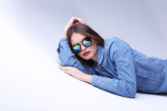 High Fashion Portrait Of Young Woman In Short Denim Overalls